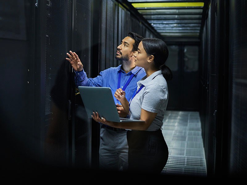 Women and men inspecting at Data centre