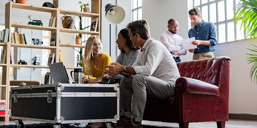 Group of professionals together and discussing