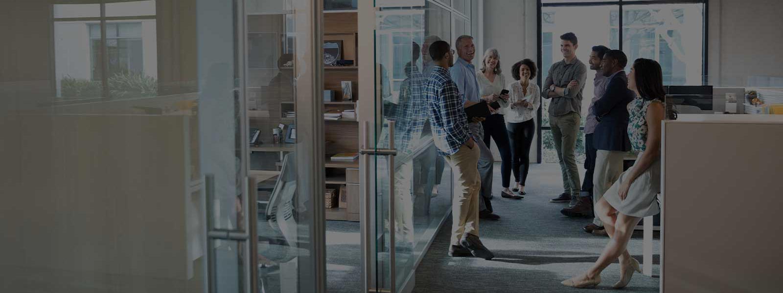 Office Employees standing in lobby