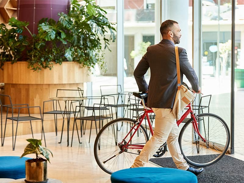 A man sitting on Cycle