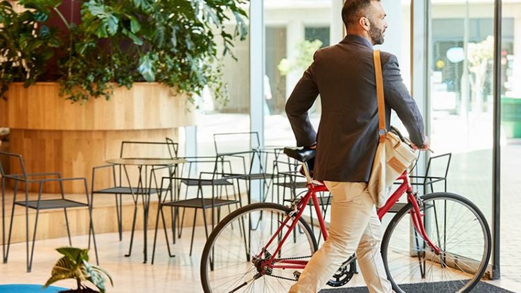 A man sitting on Cycle