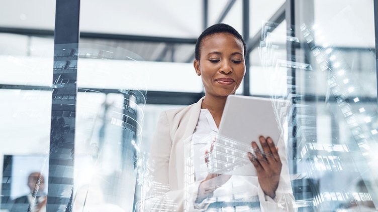 A woman analysis a data in the paper