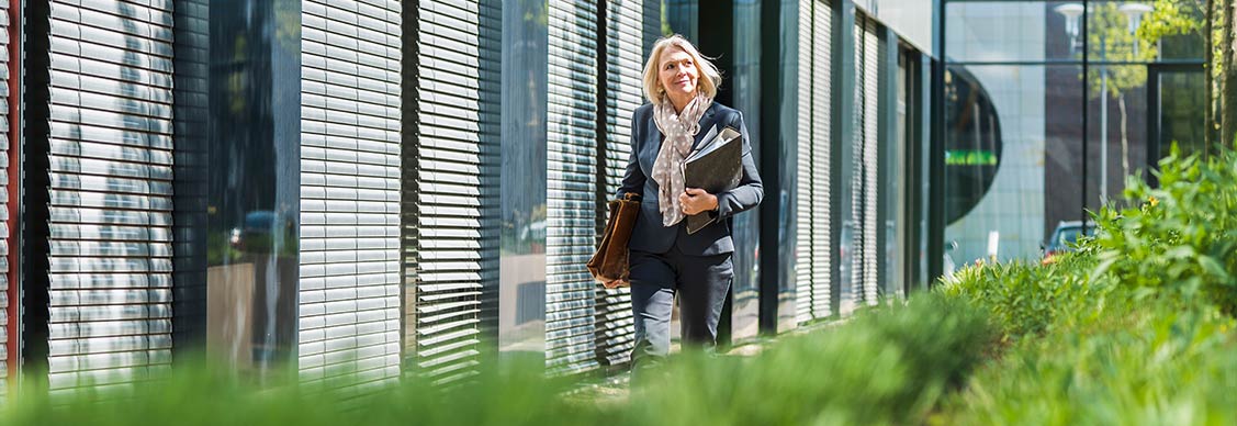 A woman walking in the campus