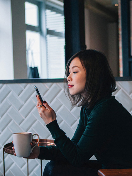 Lady looking into mobile