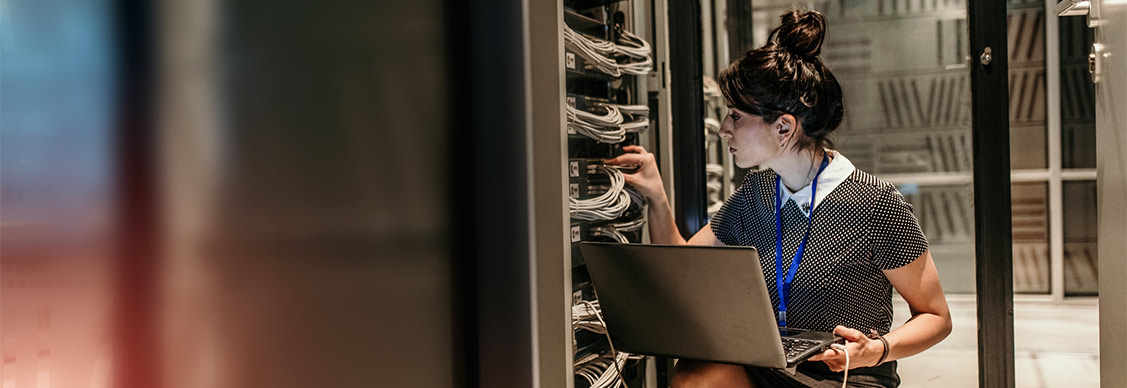 a woman is checking the server