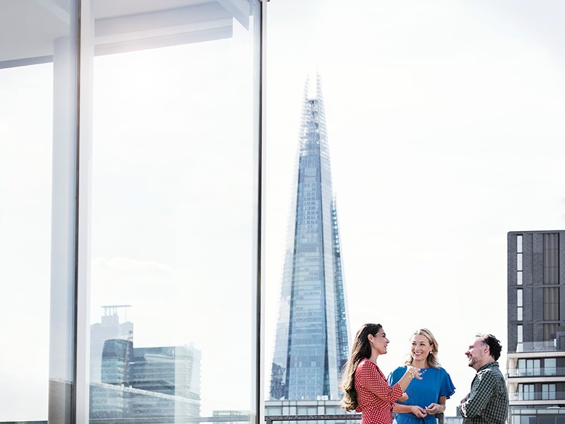 People talking on rooftop